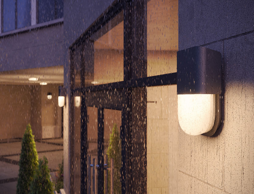Close up of wall mount Jaki fixture in the rain