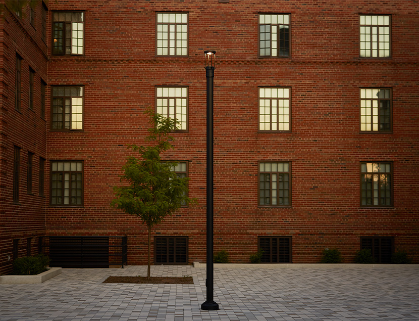 Eclipse luminaire in courtyard outside of apartment building